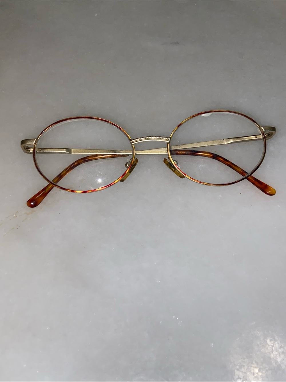 Eyeglasses on surface Frame